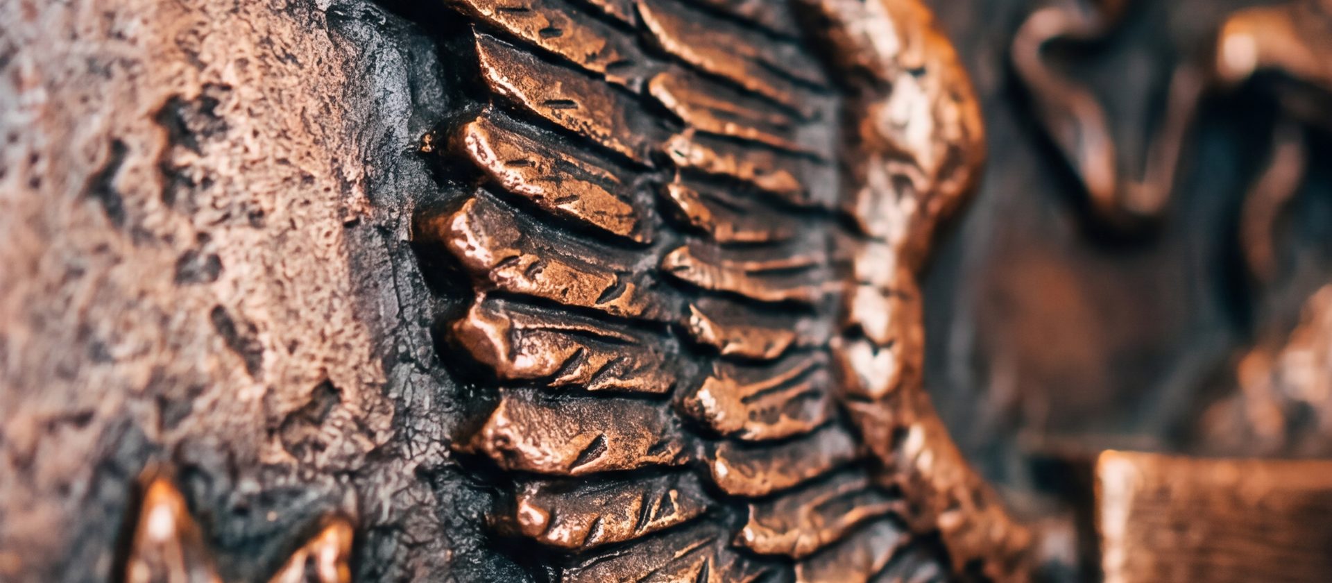 Close-up of a bronze eagle emblem with olive branches
